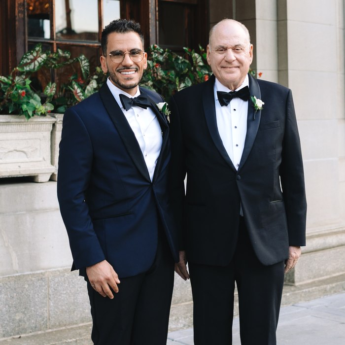 Lee and his father in tuxedos on Lee's wedding day