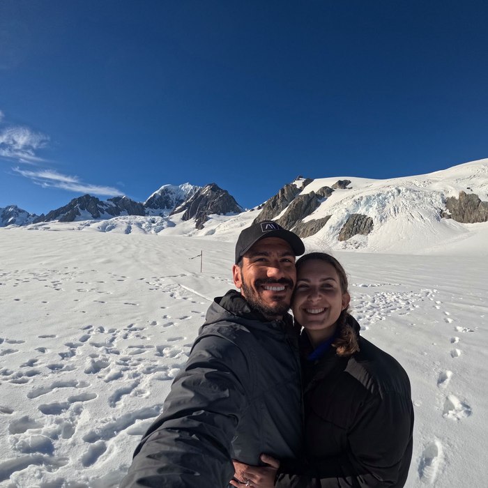Lee and his wife hiking a glacier in New Zealand