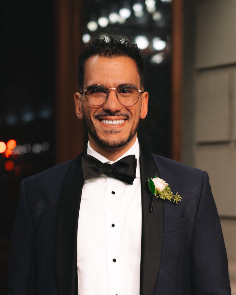 Portrait of Lee Dennis in black tie
